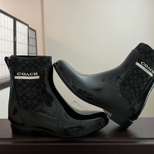 Coach rain boots, size 8. Used only once.